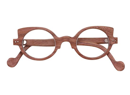 Eco-friendly eyeglasses with round-shaped light brown wooden frame and matching temples. custom made lissac brand