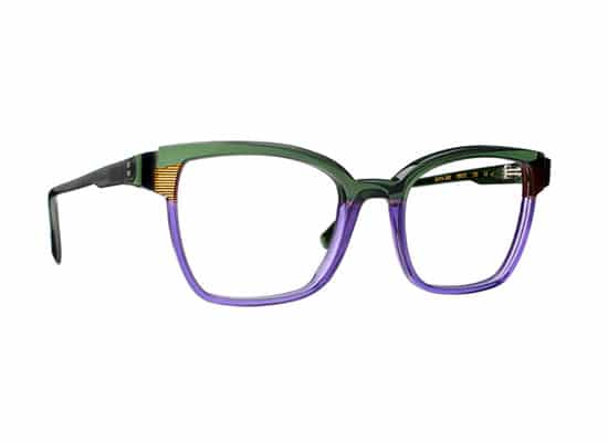 Full-rim glasses with two-tone green and purple frame, black temples and gold details. caroline abram brand