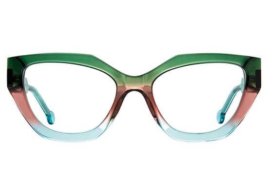Oversized cat-eye eyeglasses with a green to clear gradient frame and a bold shape.