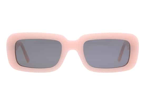 Oversized rectangular sunglasses with pastel peach frames and smoked lenses.