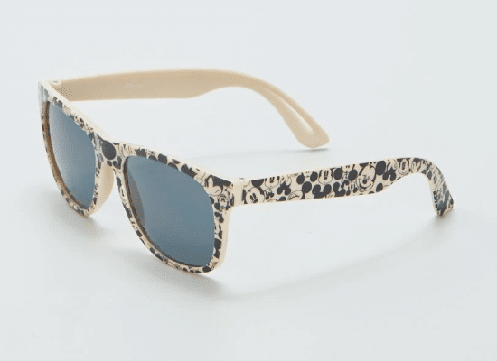 Gucci eyewear with round tortoiseshell frames and gold detailing on the temples.