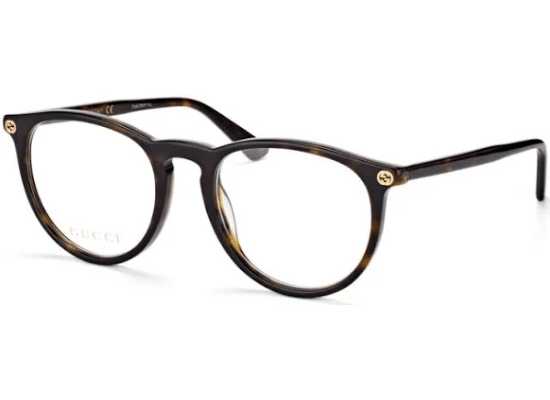 Lunettes de vue Gucci avec monture ronde écaille de tortue et détails dorés sur les branches.