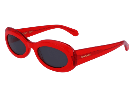 Ferragamo sunglasses with thick oval frames in bright red and dark lenses.